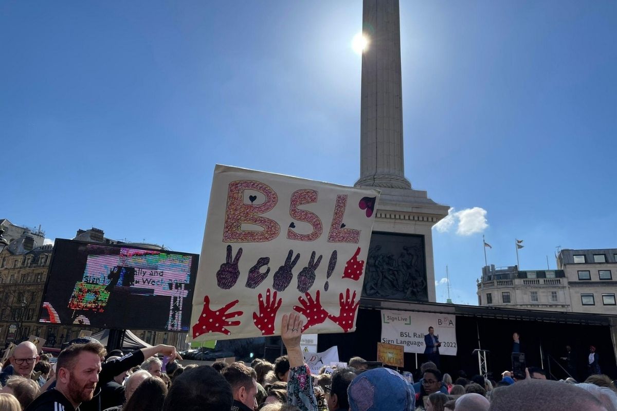 BSL sign being held up at BSL rally in London