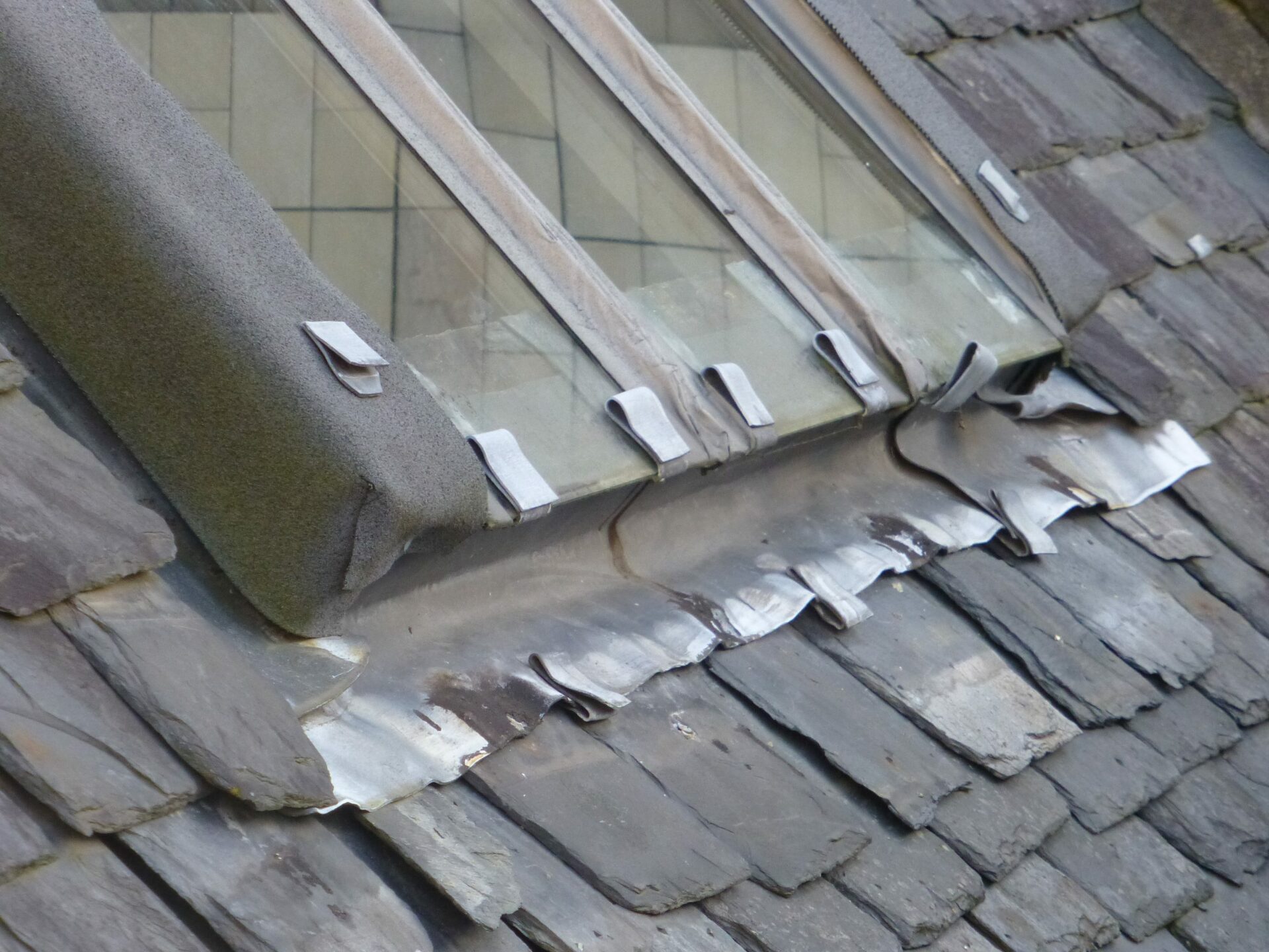 close up of slate roof and window
