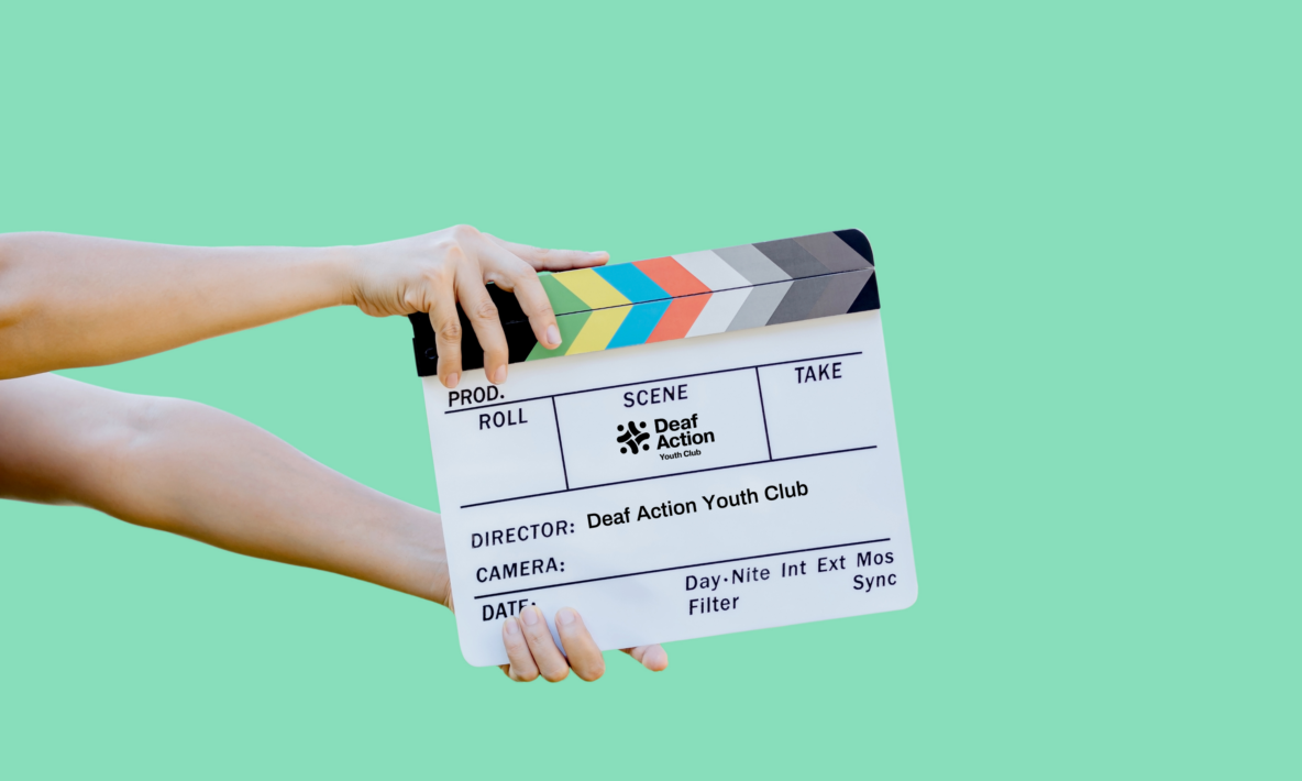 Hands holding a clapperboard with the Deaf Action Youth Club Logo. Background is mint green.